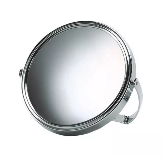 Miroir grossissant X10 rond chromé diamètre 10 cm.