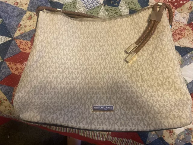 Authentic Michael Kors Shoulder Bag.  Used Condition. No Rips Or Tears.  Nice.