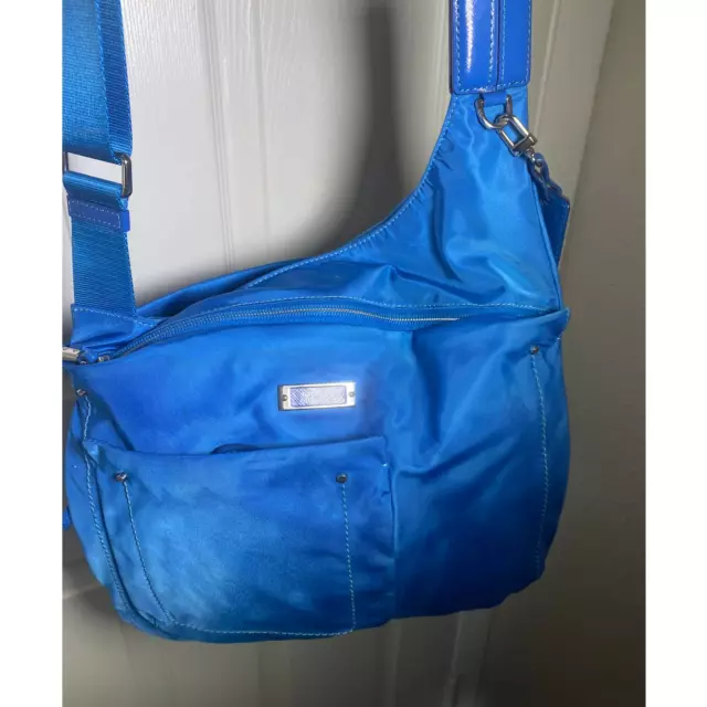 Tumi blue crossbody travel organizer bag