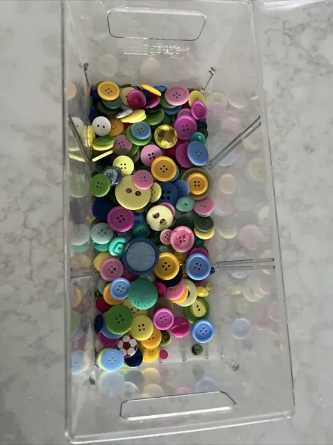 Large bundle of various buttons in different colours sizes and shapes