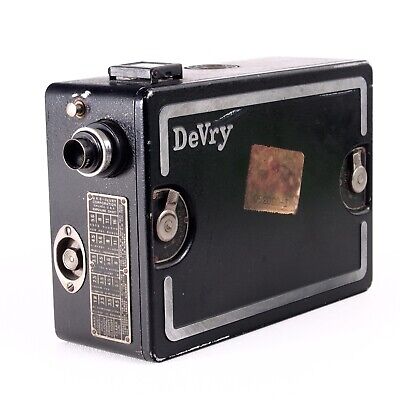 ↑ Cámara de caja "Lunchbox"" DeVry QRS 16 mm con Graf 20 mm f/3,5 - ¡Funciona!
