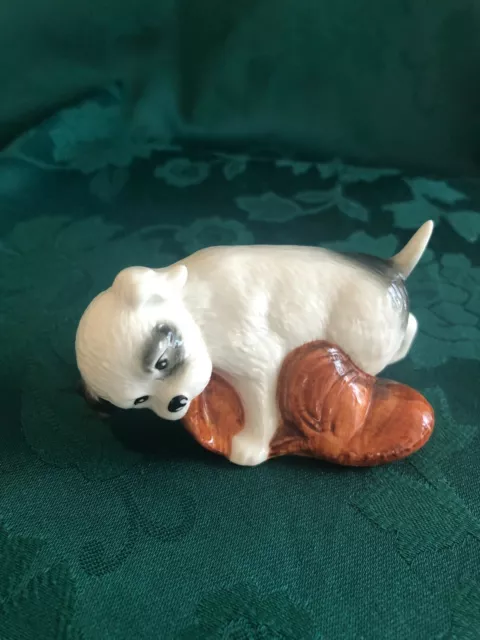 SMALL PORCELAIN  DOG FIGURINE COLLECTABLE MARKED E W/playing with old shoe/