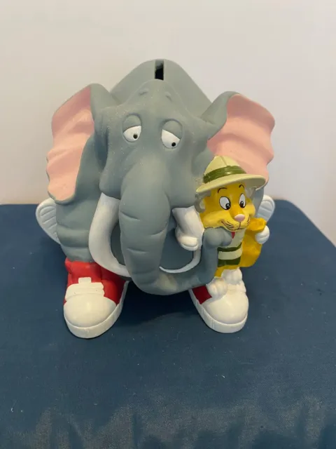 1997 MGM GRAND Plastic Elephant And Zoo Keeper Coin Piggy Bank