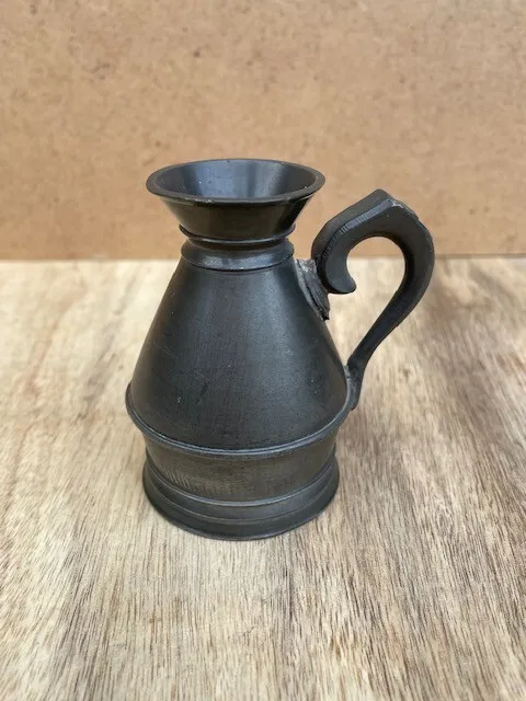 An Antique Pewter haystack Measure