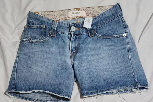 Levis 504 SLOUCH Denim Shorts Juniors Size 5 Lightwash Waist 29" Raw Hemmed EUC