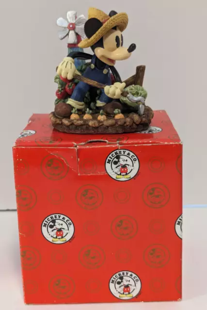 Enesco Disney  "Mickey Hoeing Corn Figurine" Mickey Mouse in box.