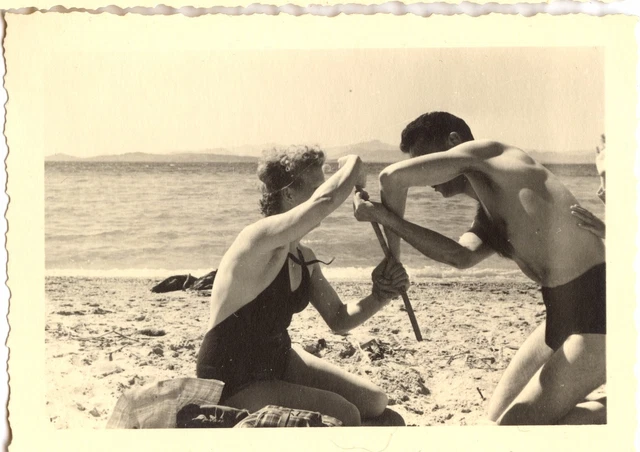 Men's Women on the Beachfront - Old Year Photo. 1950
