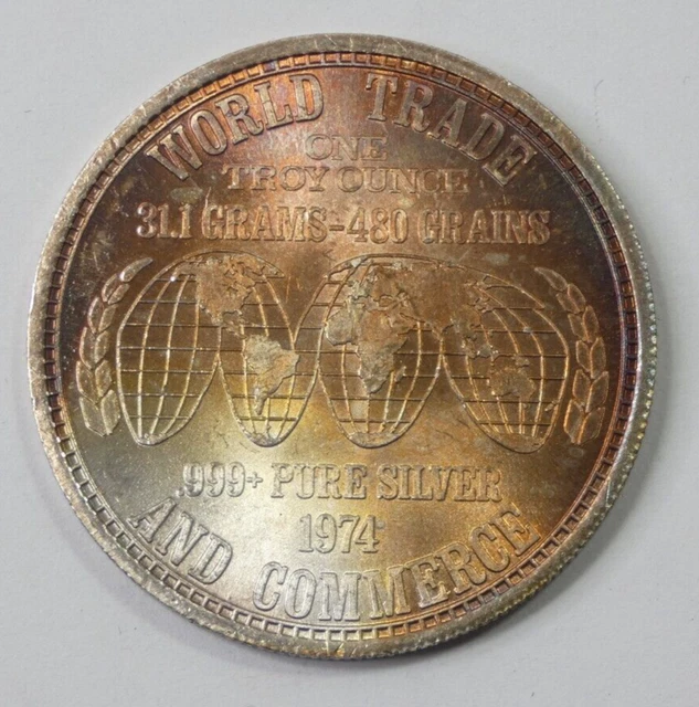 1973 'WORLD TRADE AND COMMERCE' 1 OZ .999 Silver Art Bar / 25C