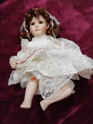 Crying porcelain sales doll