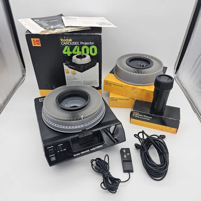 Proyector deslizante de carrusel Kodak 4400 negro con bandejas remotas manual caja original
