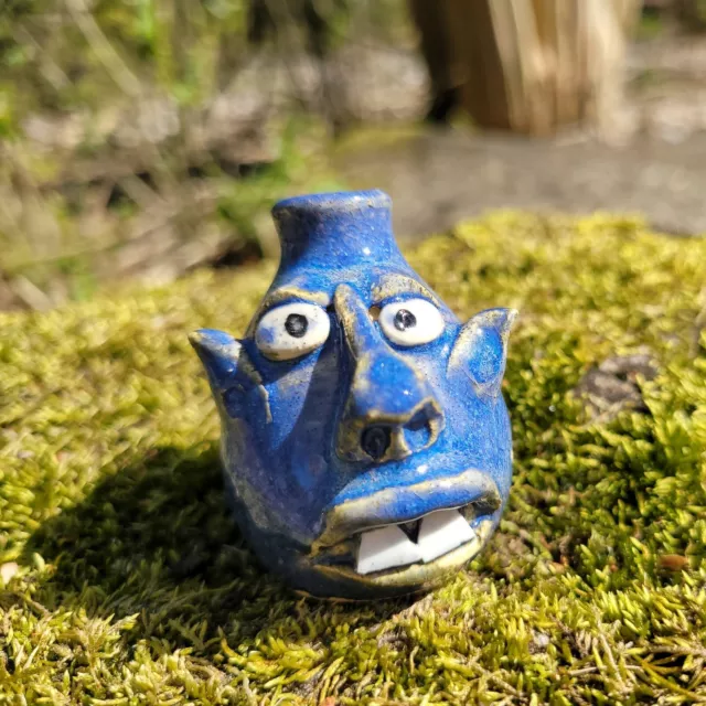 2.25" Mini Blue Face Jug by Wayne Hewell 2.25" Mini Blue Face Jug by Wayne Hewell