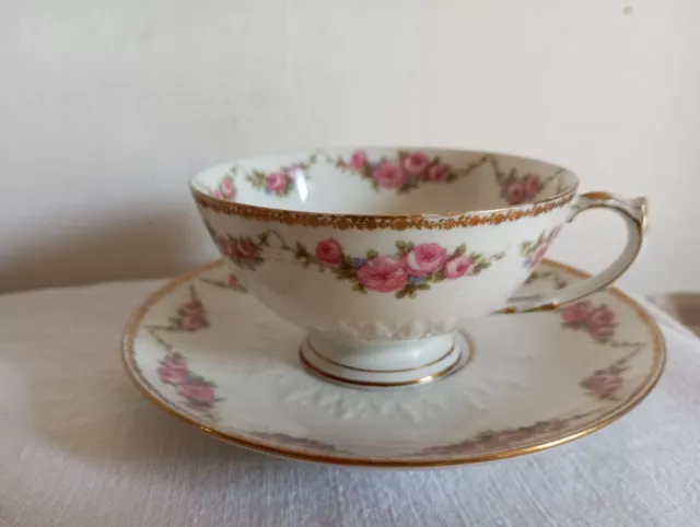 Tasse et sous tasse en porcelaine de Limoges GOA