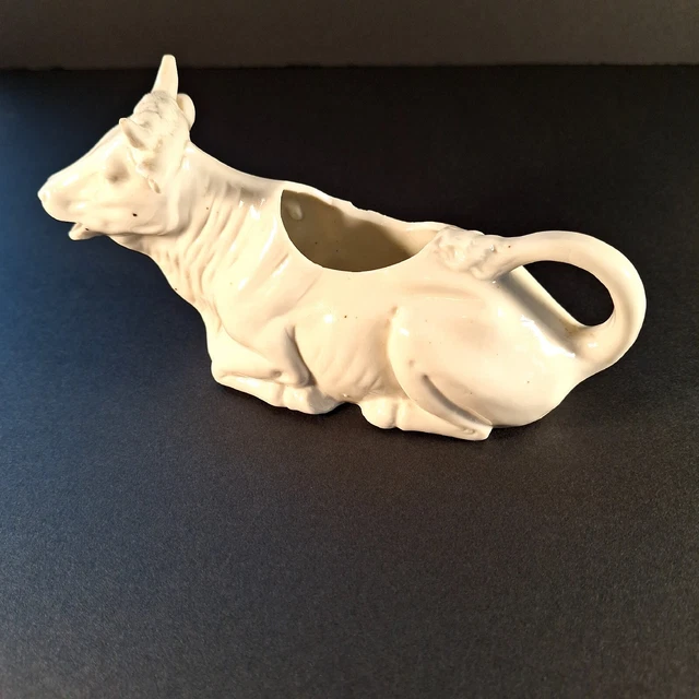 Porcelain vintage bovine cow bull creamer 7" x 4"
