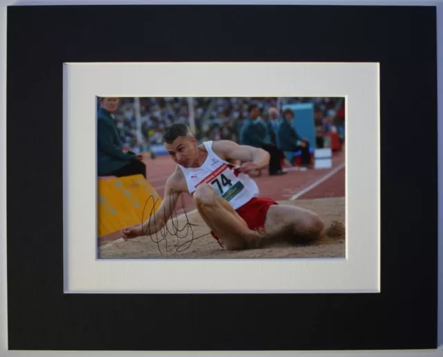 Jonathan Edwards Signed Autograph 10x8 photo display Athletics Sport AFTAL COA