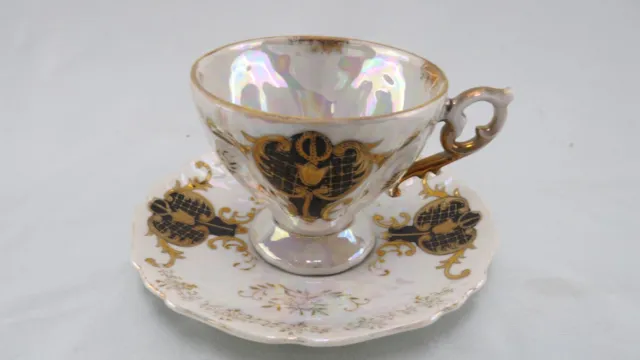 Juego de taza de té y platillo Royal Sealy China iridiscente con diseño negro y dorado Japón
