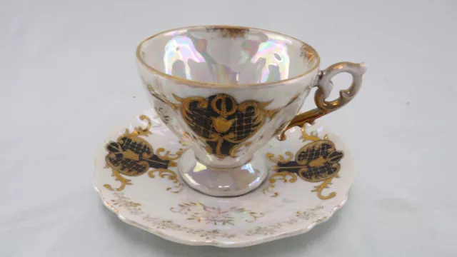 Juego de taza de té y platillo Royal Sealy China iridiscente con diseño negro y dorado Japón