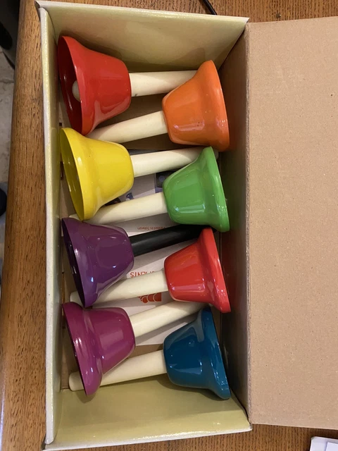 Two sets of metal handbells