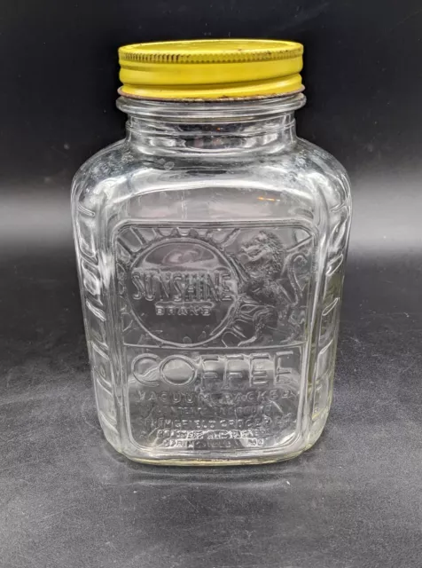 Vintage Embossed Clear Glass Sunshine Brand Coffee Jar Quart  w/Yellow Lid. Lion