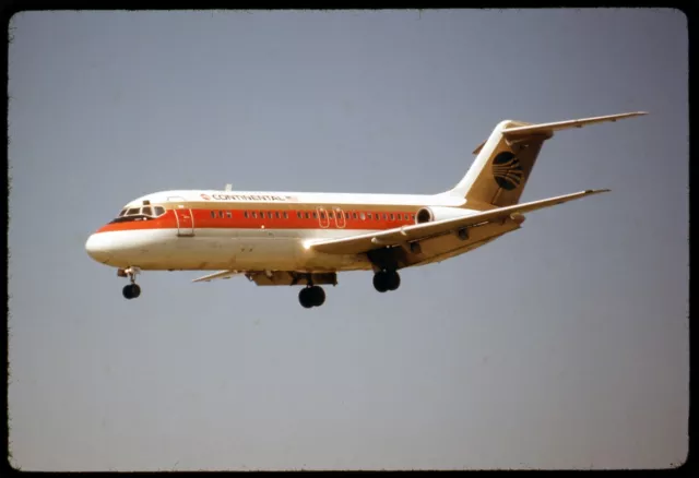 Vintage 35mm Ektachrome slide of Continental DC-9-15RC N8911 shown in April 1973