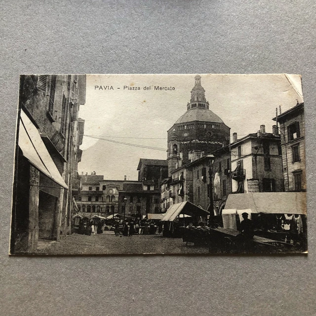 B) Cartolina formato piccolo Pavia piazza mercato 1927 annullo ambulante