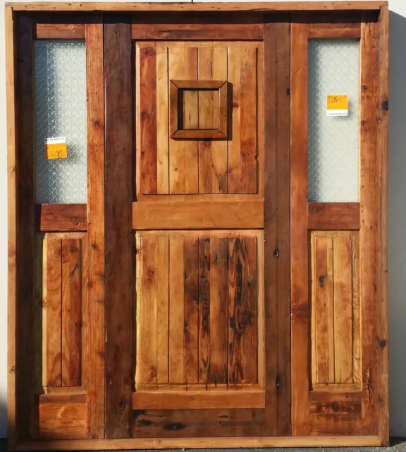 Rustic reclaimed lumber side lites door solid wood story book castle glass door