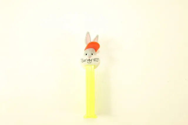 1996 Warner Brothers PEZ Dispenser Bugs Bunny Yellow Body Orange Baseball Cap