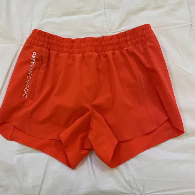 Athleta Girl Size L (12) Running Shorts Orange
