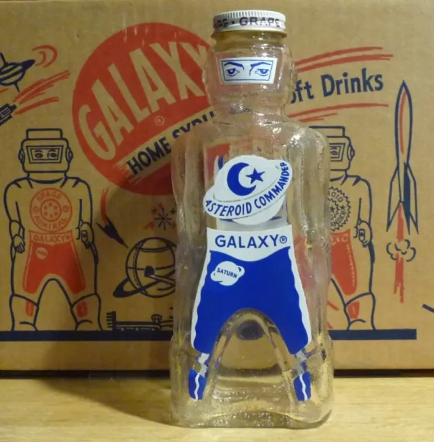 Blue Galaxy "Asteroid Commander " Syrup Bottle Bank Empty 1953 Mint