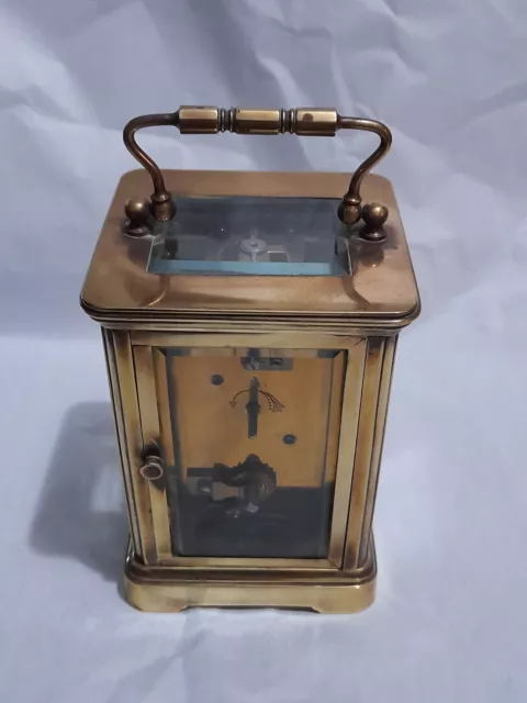 Antique Edwardian brass carriage clock with enamel face. 2