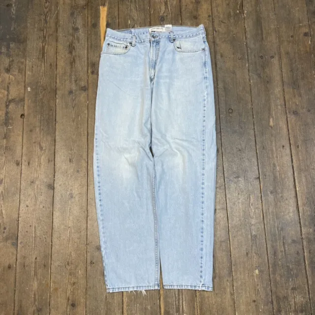 LEVIS 560 - Vtg 90s Raw Hem Loose Fit Light Blue Mom Jeans, Womens