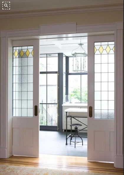 Beautiful Interior Pocket Doors with 3/4 Glass with Heritage design panels 3