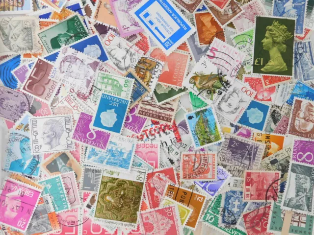 STAMP WORLD WIDE lot hors papier 700 pc collection philatélique kiloware...