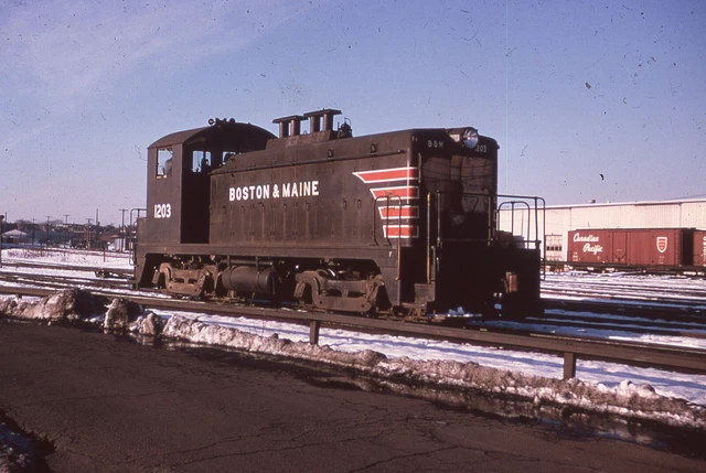 Duplicate  Train Slide Boston&Maine Rebuilt Switcher #1203 (W/E-7 Engine)  NW2