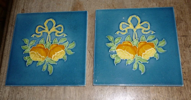 Maw & Co tiles, pair, floral, blue with yellow flower, relief, majolica? 6x6"