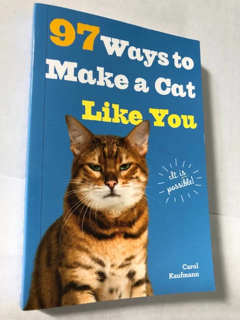 A Book " 97 WAYS TO MAKE A CAT LIKE YOU"by Carol Kaufmann