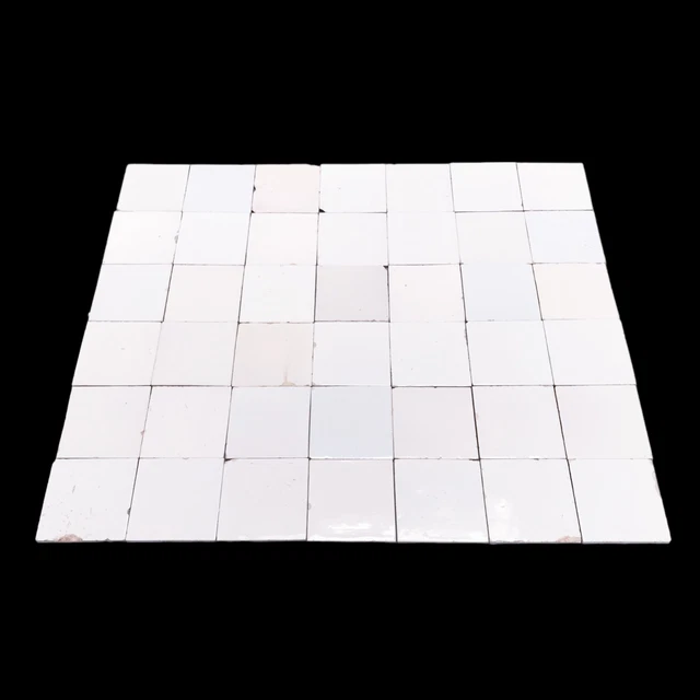 Large field of 40 Dutch Delft White tiles, "witjes", 19th ct.