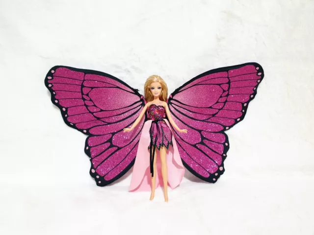 Barbie mariposa magic wings sales doll