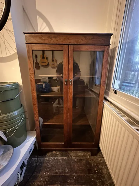 Vintage wooden and glass display cabinet