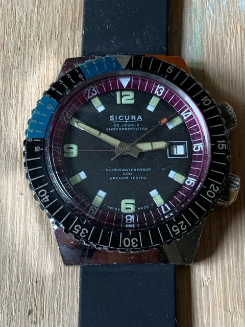 A Rare Vintage Sicura Apollo 23 Jewels Gents Watch. Stainless steel strap and case - 39mm. Two tone