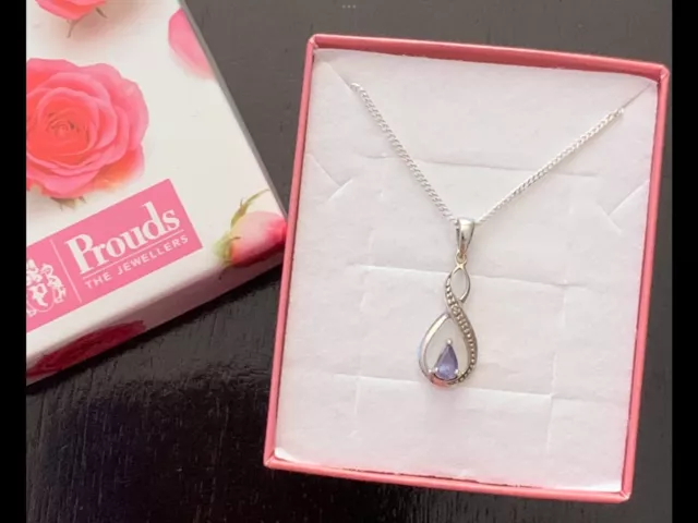 Prouds White Gold Tanzanite And Diamond Pendant - Boxed