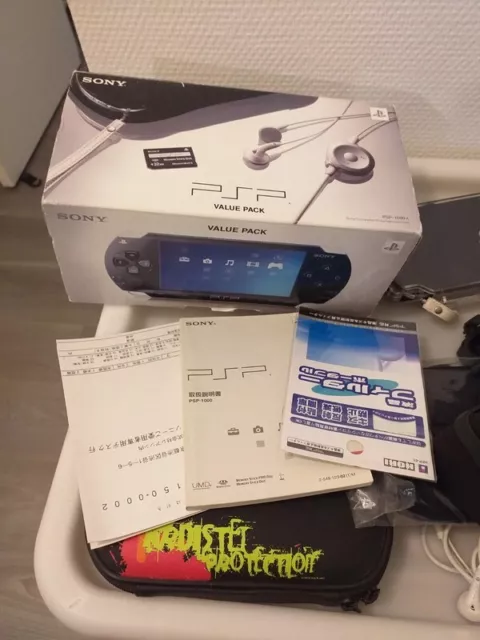 Console - Psp 1000k, 1ère sortie japonaise avec jeux, films et accessoires