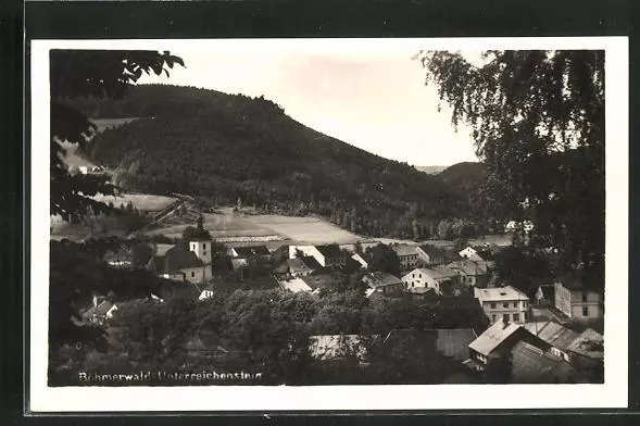 AK Unterreichenstein /Böhmerwald, Ortsansicht mit Kirche und Bäumen