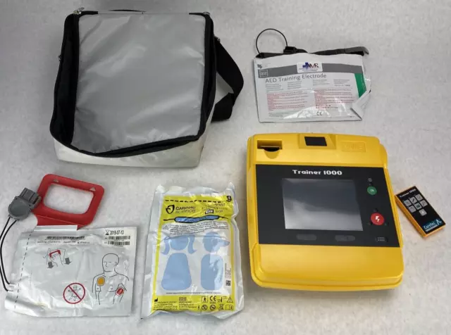 Coretec 8724637 AED Trainer 1000 WITHOUT AC ADAPTER Charger + EXPIRED Pads