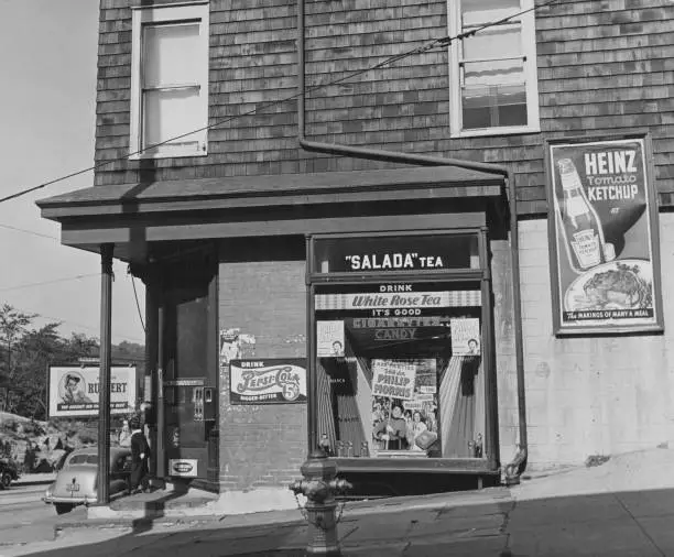 corner shop, a window display advertising Salada Tea, White Rose T Old Photo