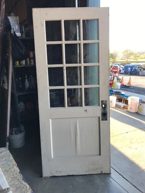 An 572 antique oak beveled glass entry door 35.75 x 83.75 X1.75