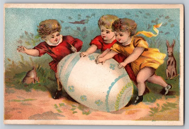 Blank Victorian Trade Card Kids / Kids Rolling a Large Easter Egg Bunny