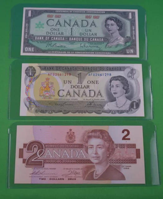 3 Canadian Bills  1 x1973 $1.00  - 1 x1986  $2.00 & 1 x1867-1967 $1 Uncirculated