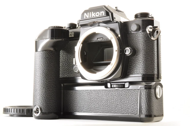 Lire [Exc+5] Boîtier pour appareil photo reflex argentique Nikon FE