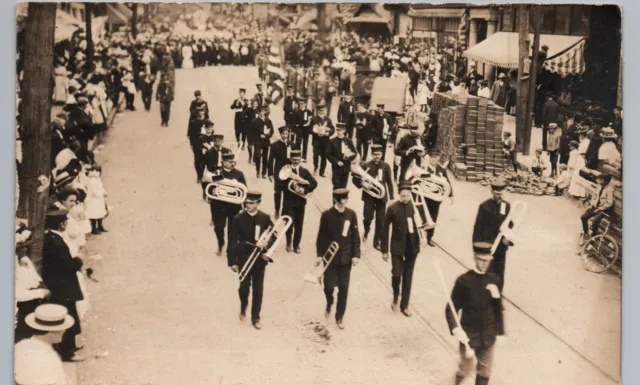 MARCHING BAND STREET PARADE real photo postcard rppc downtown main avenue crowd