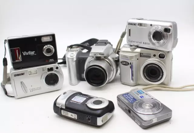 C x7 Vintage Digital Cameras Inc. Minolta Dimage Z1, Song Cyber-Shot etc